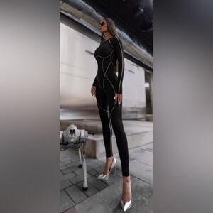 So Real Black Jumpsuit with glow in the dark white Accents. M